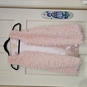 Copper key, size 10-12, youth fur vest, great condition